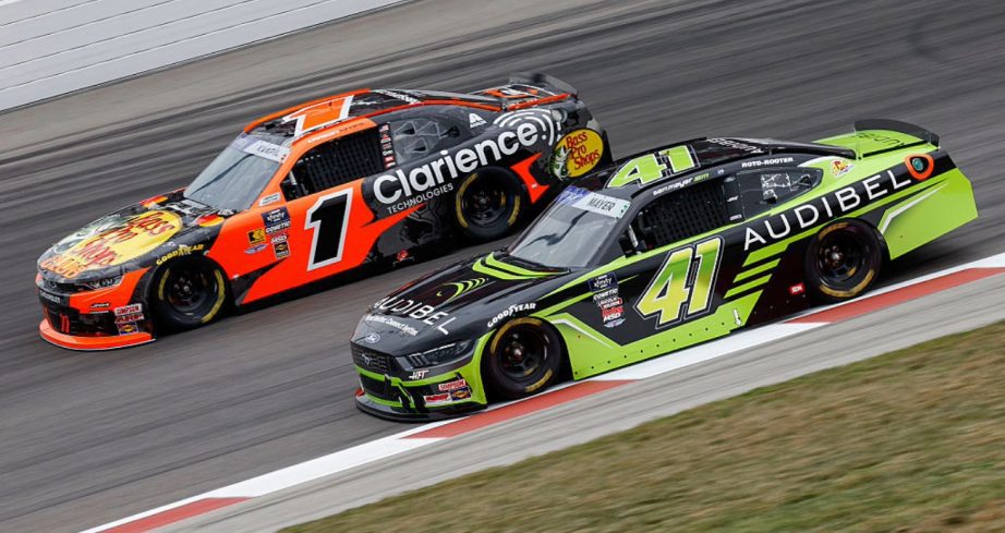 Sam Mayer and Carson Kvapil drive at Gateway.