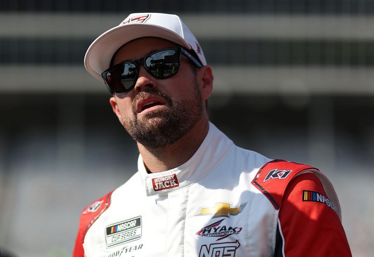 Ricky Stenhouse Jr. looks on.