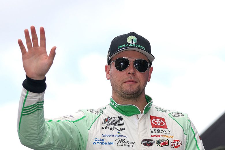 Erik Jones waves to fans.