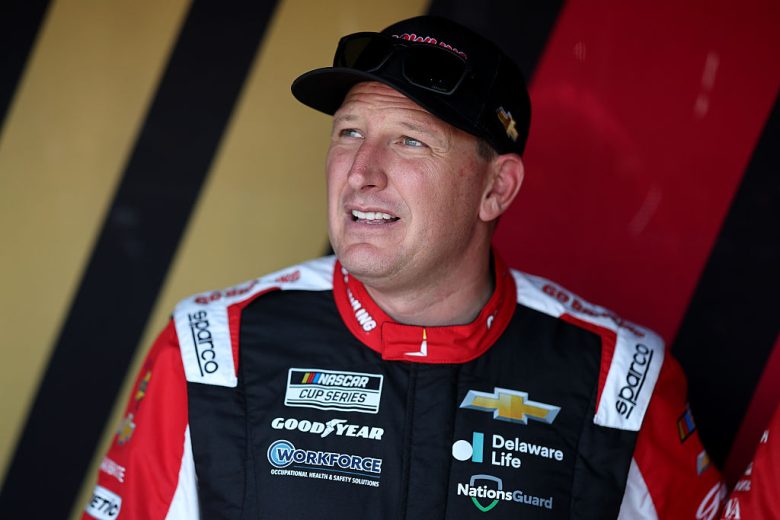 Michael McDowell looks on.