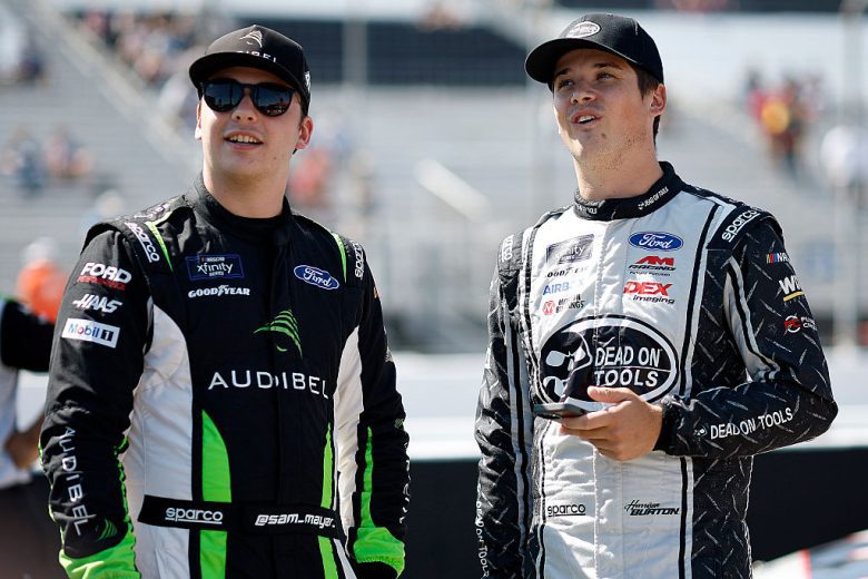Sam Mayer and Harrison Burton look on at Gateway.