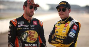 Chase Briscoe and Christopher Bell talk on the grid during practice on Aug. 15, 2025 at Richmond Raceway.