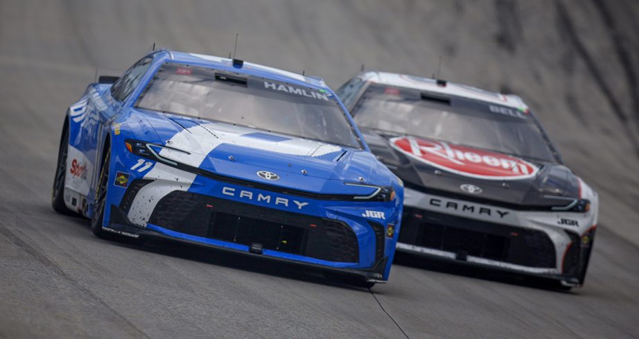 View of Denny Hamlin and Christopher Bell racing.