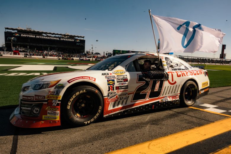 Corey Heim celebrates after winning at Daytona.