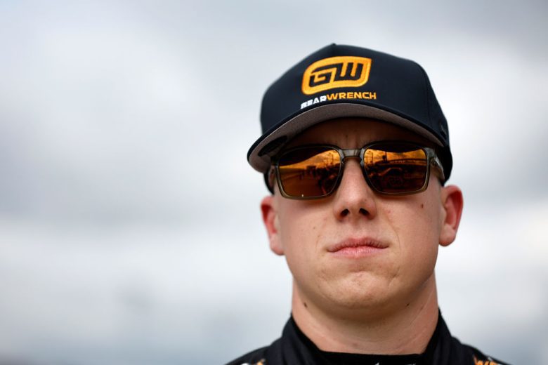 John Hunter Nemechek looks on.
