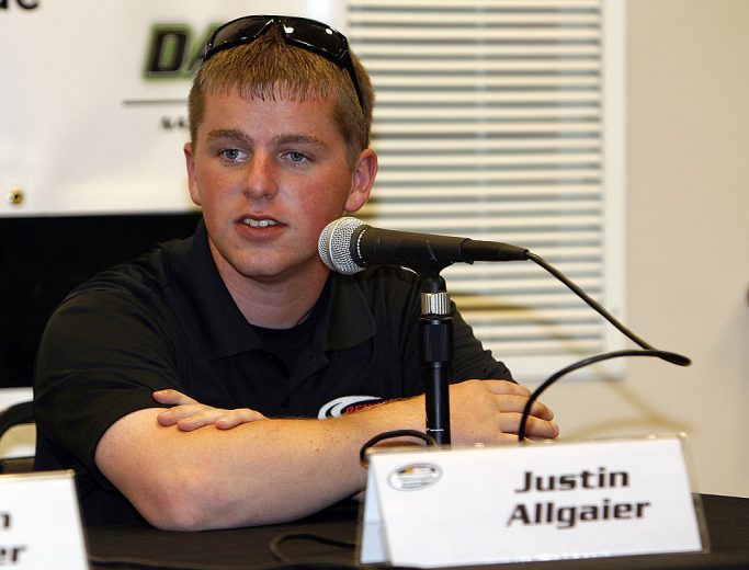 Justin Allgaier looks on.