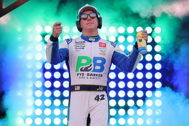 John Hunter Nemechek waves to fans.