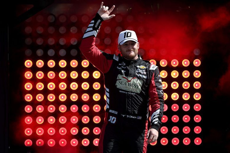 Ty Dillon waves to fans.