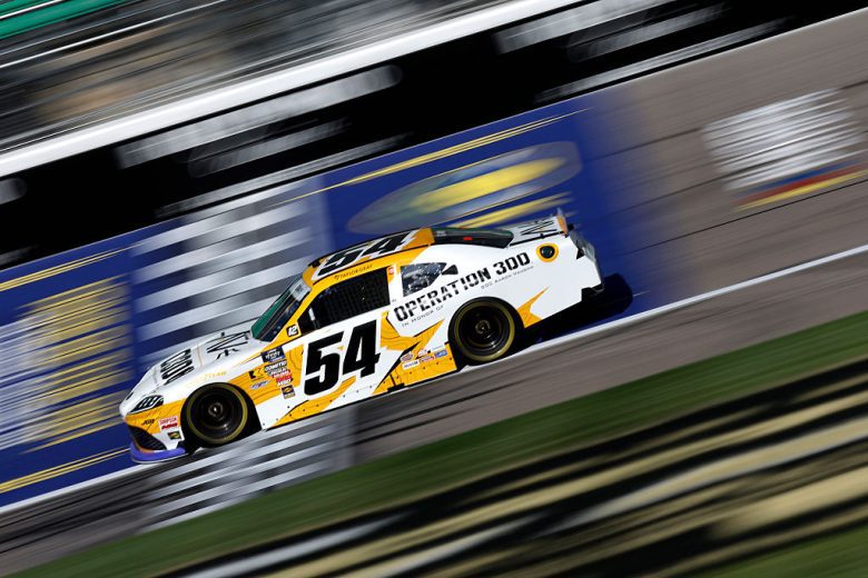 Taylor Gray drives at Kansas.
