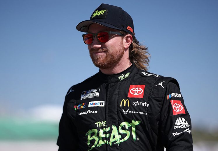 Tyler Reddick looks on at Kansas.