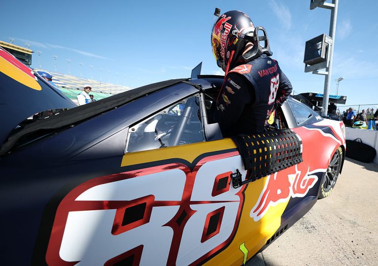 Shane van Gisbergen enters his car at Kansas.