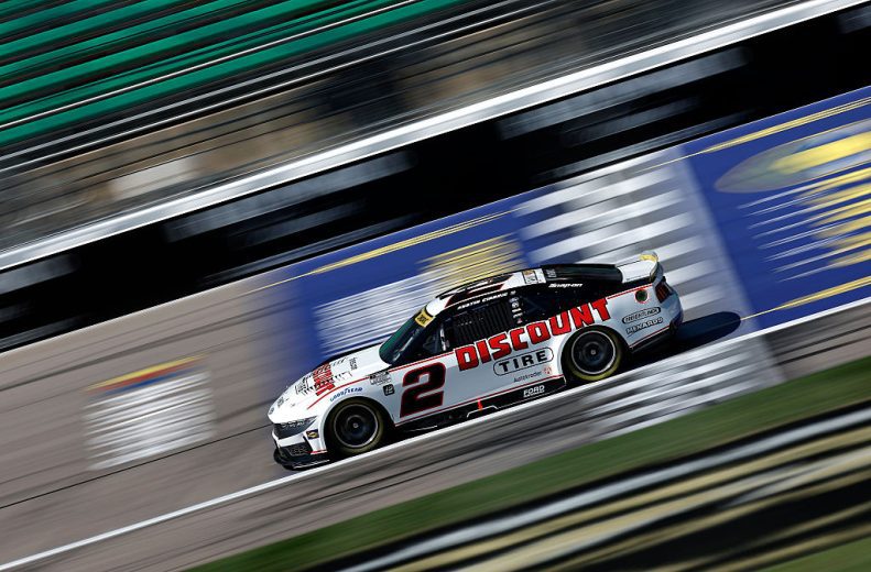 Austin Cindric drives at Kansas.