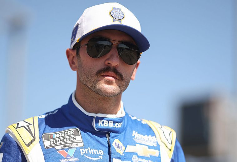 Chase Elliott looks on at Kansas.