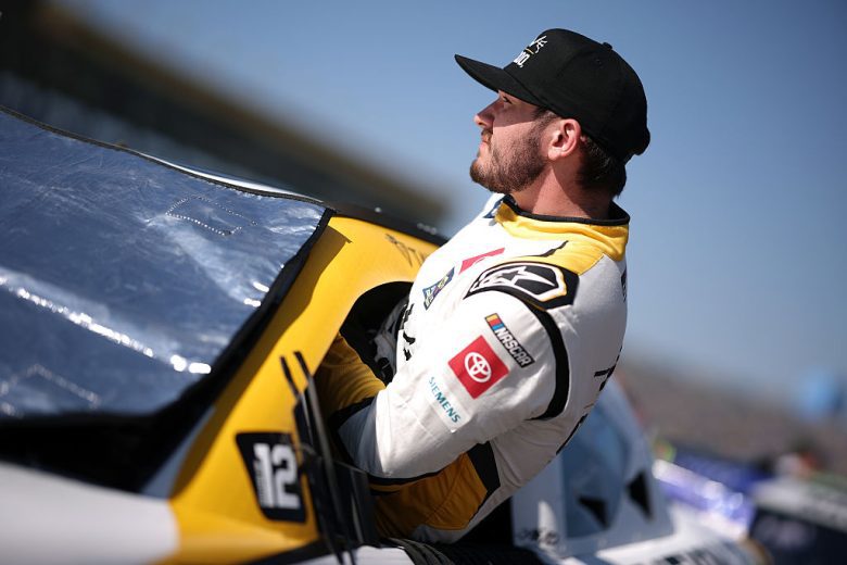 Taylor Gray enters his car at Kansas.