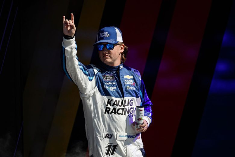 Brenden Queen waves to fans at Kansas.