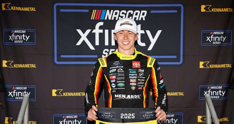 Brandon Jones celebrates after winning the pole at Kansas.