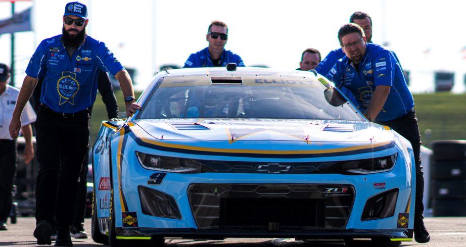 Chase Elliott's car rolls through the Kansas garage.