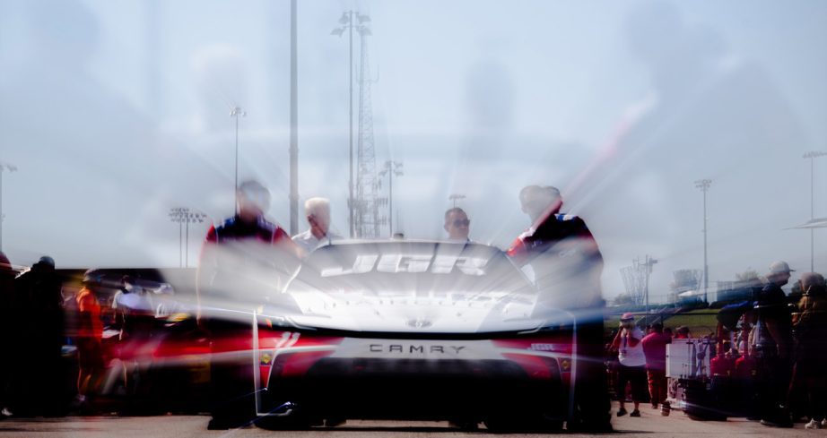 Denny Hamlin's car rolls through the Kansas garage.