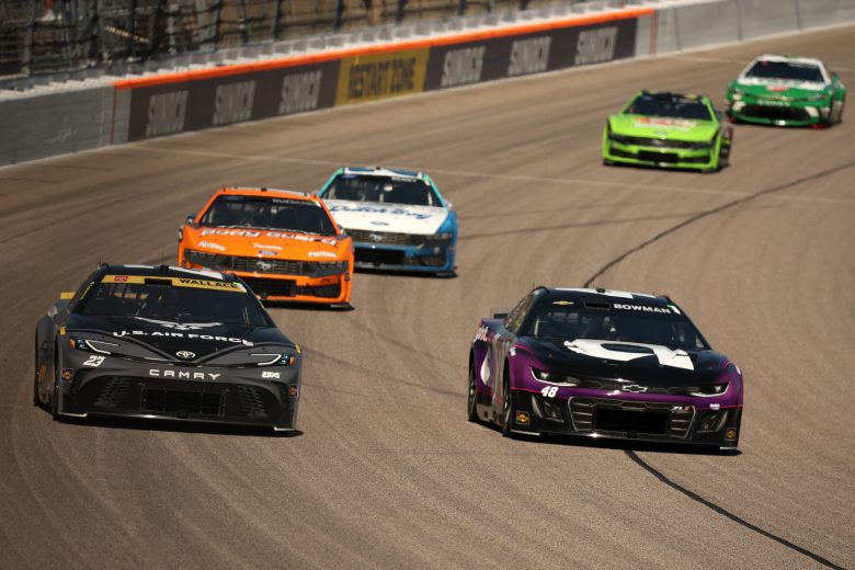 Bubba Wallace and Alex Bowman race at Kansas.