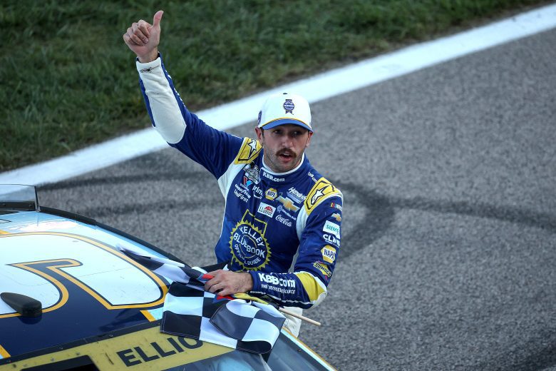 Chase Elliott tosses up a thumbs-up after winning Kansas.