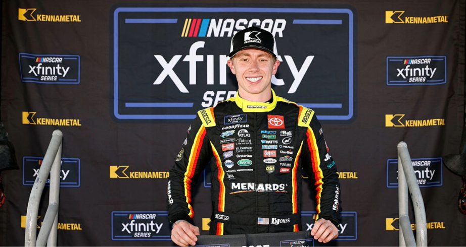 Brandon Jones celebrates after winning the pole at Phoenix.
