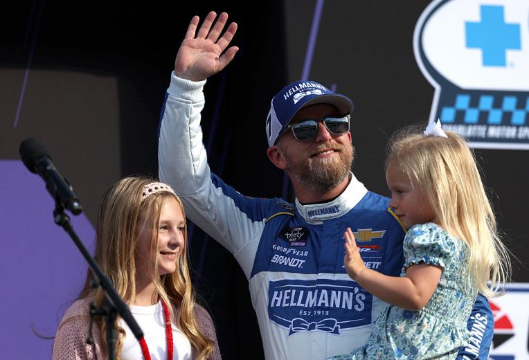 Justin Allgaier waves to fans at Charlotte Roval.