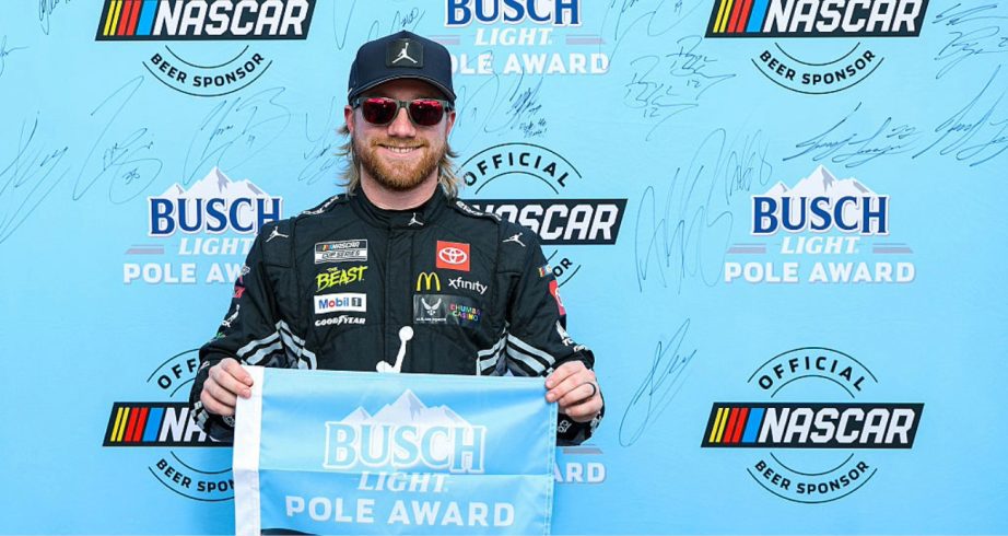 Tyler Reddick celebrates after winning the pole at Charlotte Roval.