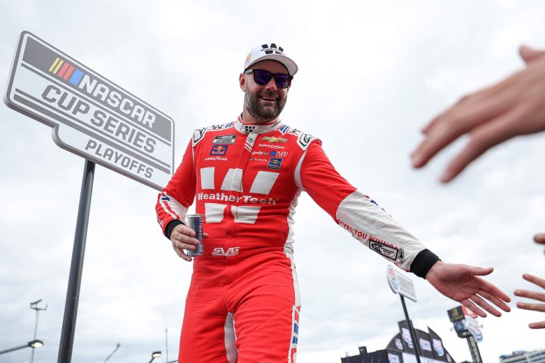Shane van Gisbergen gives high fives.