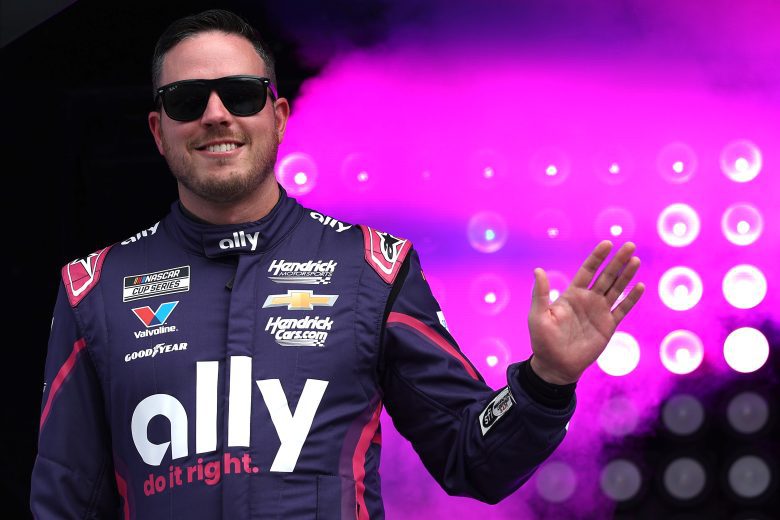 Alex Bowman waves to fans.