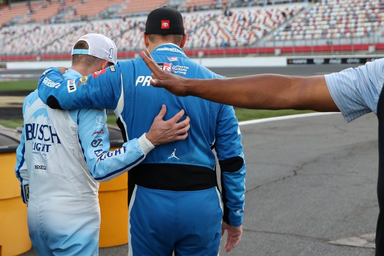 Denny Hamlin talks with Ross Chastain.