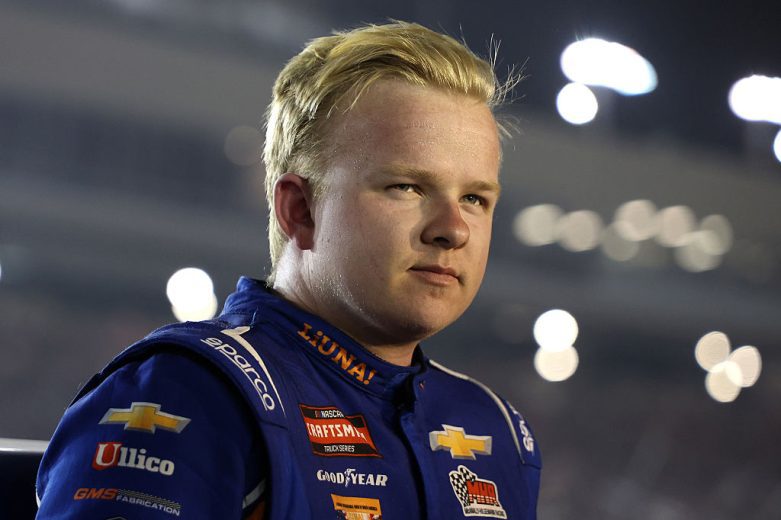 Tyler Ankrum looks on.