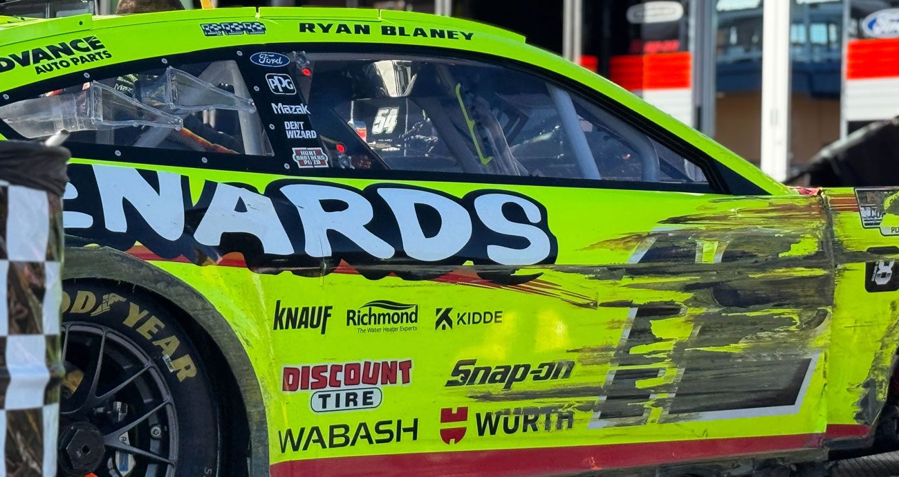 A view of Ryan Blaney's No. 12 Team Penske Ford with right-side damage at Las Vegas Motor Speedway.