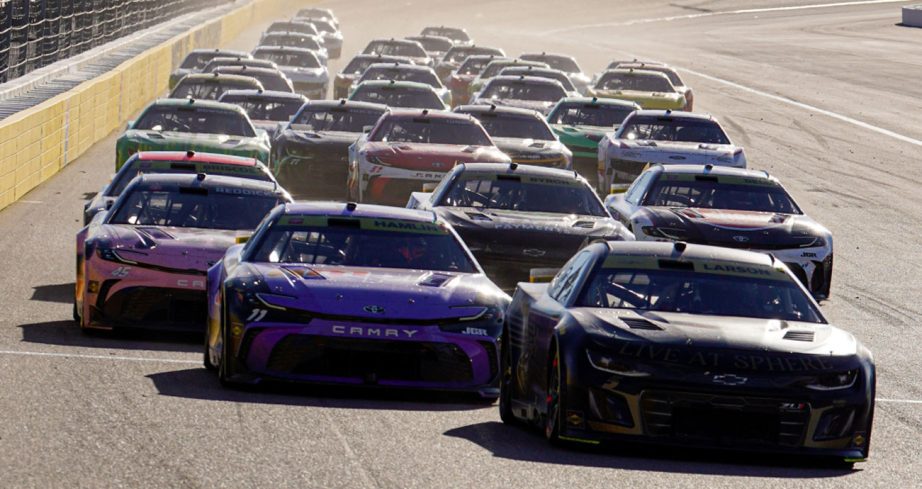 NASCAR Cup Series cars race at Las Vegas Motor Speedway.