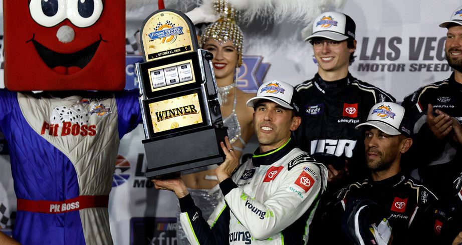 Aric Almirola poses for a photo in Victory Lane at Las Vegas Motor Speedway.