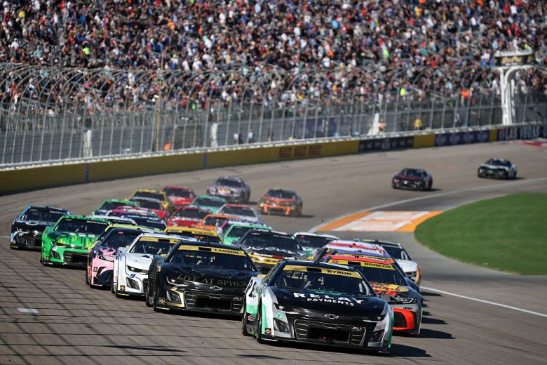 NASCAR Cup Series cars race at Las Vegas Motor Speedway.