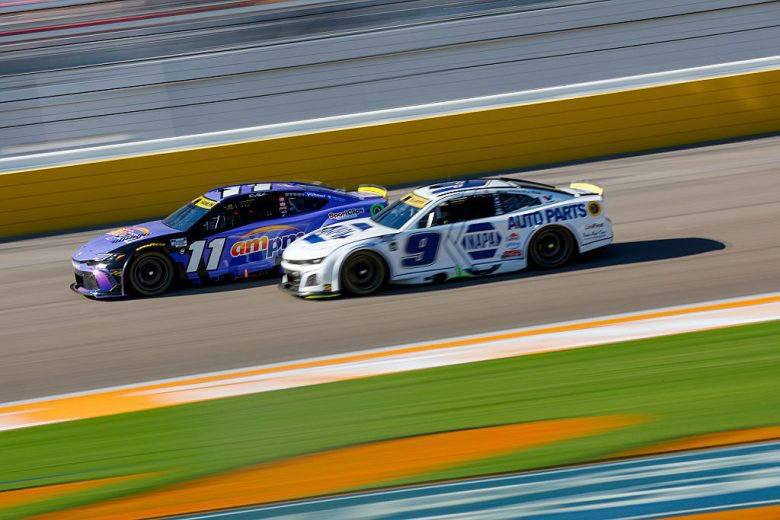 Denny Hamlin, in the No. 11 Toyota, races ahead of Chase Elliott in the No. 9 Chevrolet at Las Vegas Motor Speedway.