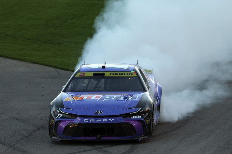 Denny Hamlin does a celebratory burnout.