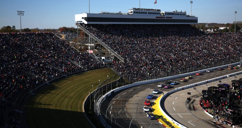 NASCAR Cup Series cars race at Martinsville Speedway.