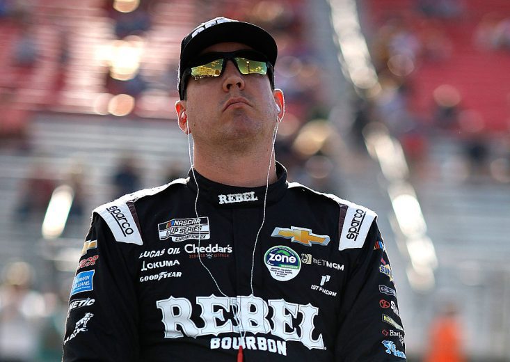 Kyle Busch looks on.