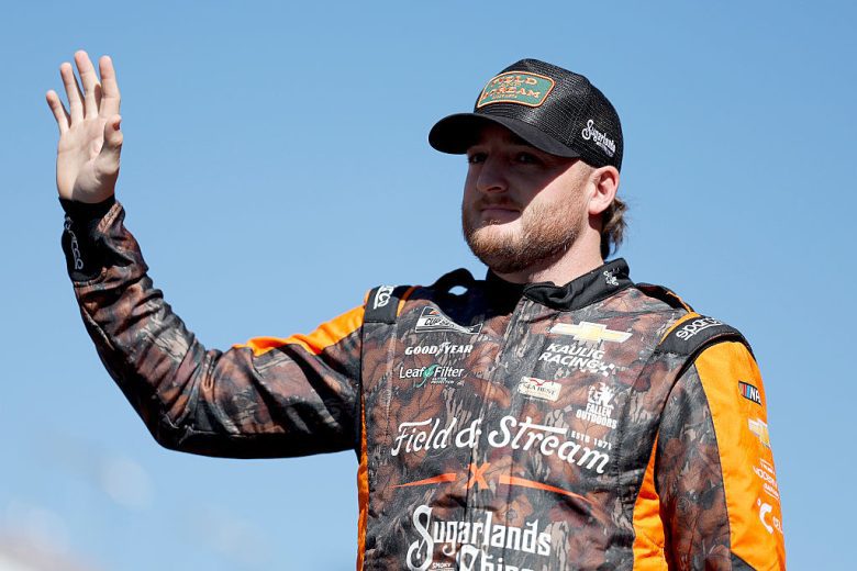 Ty Dillon waves to fans.