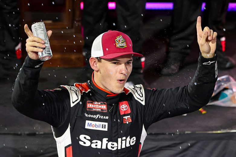 Corey Heim celebrates in Victory Lane at Martinsville.