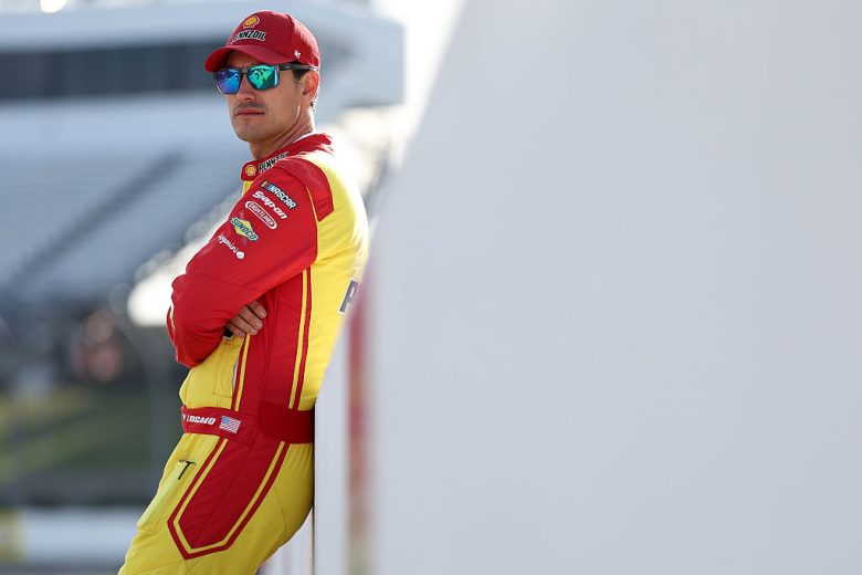 Joey Logano looks on at Martinsville.