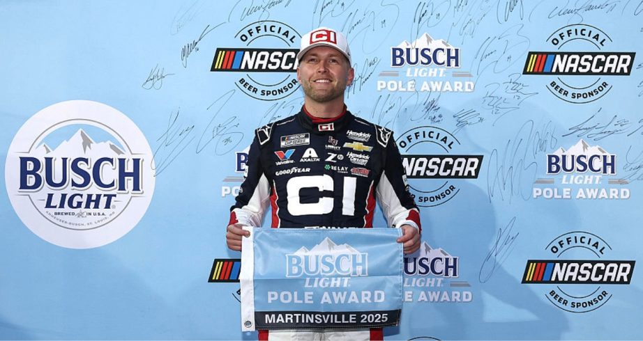 William Byron celebrates after winning the pole at Martinsville.