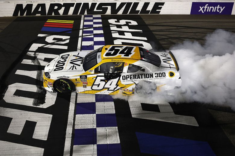 Taylor Gray does a burnout at Martinsville.