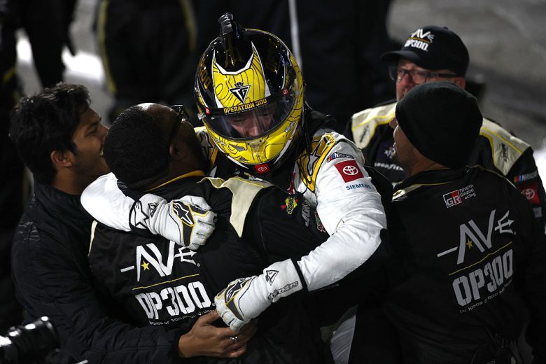 Taylor Gray celebrates with his crew after winning at Martinsville.