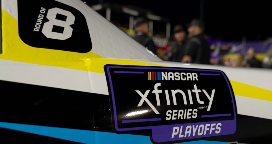 A NASCAR Xfinity Series Playoffs sticker on a race car.