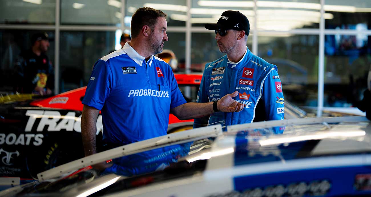 No. 11 crew chief Chris Gayle, left, chats with Denny Hamlin in the Cup Series garage at Phoenix Raceway