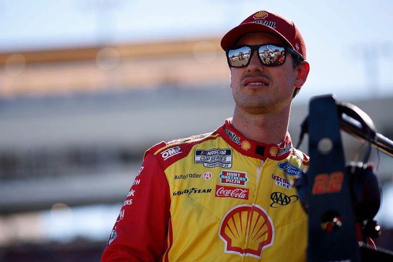 Joey Logano looks on at Phoenix.