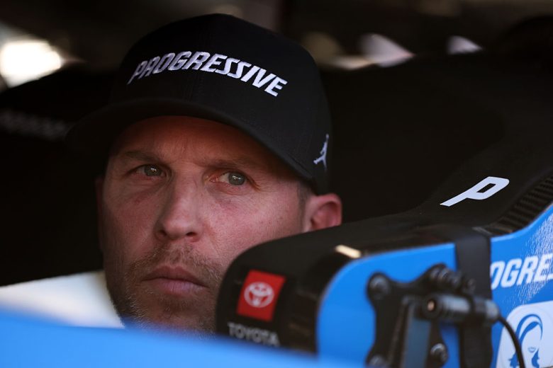 Denny Hamlin sits in his car at Phoenix.