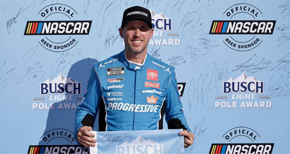 Denny Hamlin celebrates after winning the pole at Phoenix.